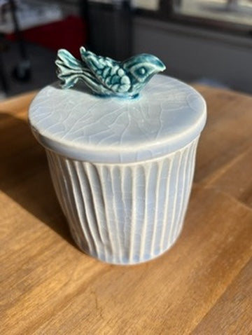 Hand-carved, lidded bird jar